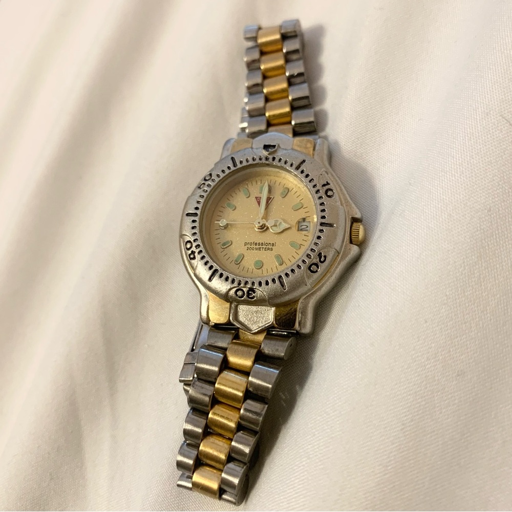Guess Women’s Vintage Two-Tone Silver & Gold Roman Numeral Analog Watch